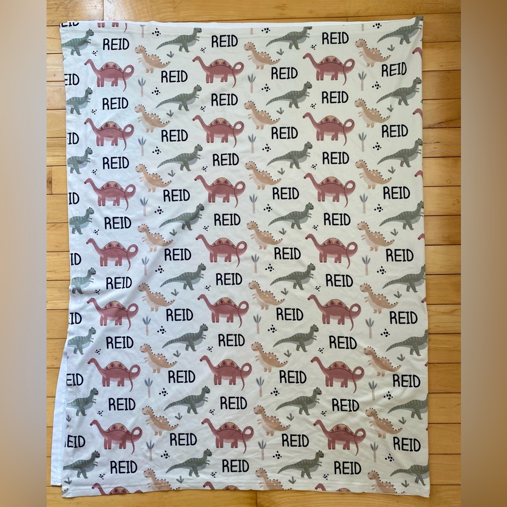 Personalized Caden Lane Dinosaur Swaddle Blanket